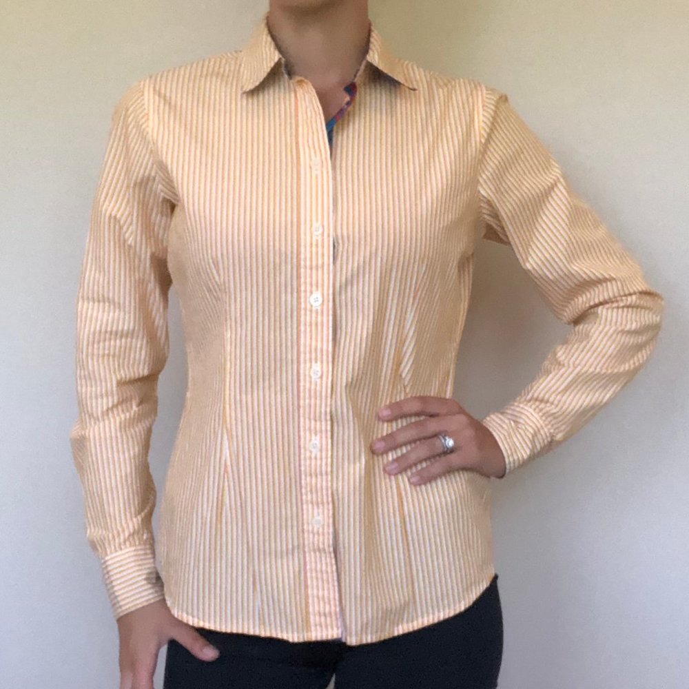 C. Wonder button-up top